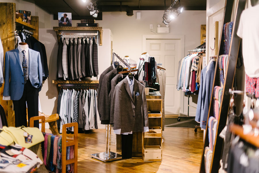 contact us The suit section of Taylor and Co, at the back of the store.